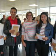 Mrs Hargreaves, head of Year 11, with Year 11 students.